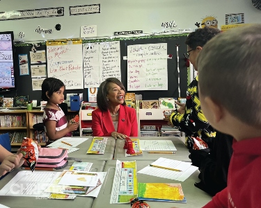  U.S. Representative Lisa Blunt Rochester speaking to students in classroom at Marshall Elementary.